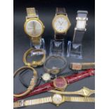 A bag of assorted wrist watches