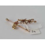 A Victorian bug brooch with ruby and pearls 5.2 gms and another double bug brooch on 9ct pin some