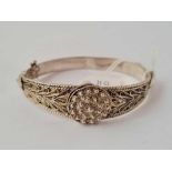 A ornate silver bangle 23.7 gms