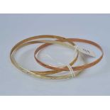 A TRIPLE THREE COLOUR GOLD BANGLE 9CT 22.1 GMS