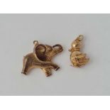 A large 9ct elephant charm and a 9ct duck charm 6g