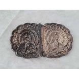 An Eastern silver two part buckle with exotic birds