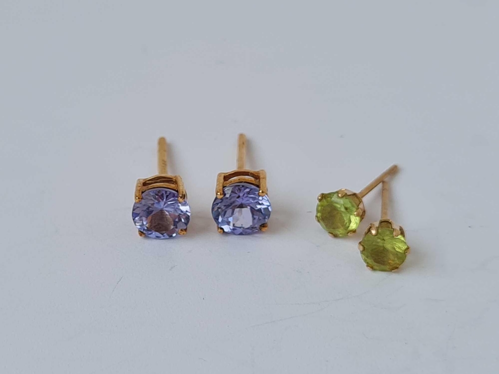 Two pairs of blue and green stone ear studs