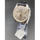 A TAGHHUGR automatic wrist watch W/O date aperture with cracked glass