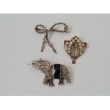A silver mounted elephant brooch and another etc.