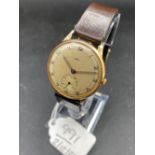 A gents MAJEX wrist watch 9ct with seconds dial