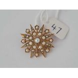 A PEARL SET STAR BROOCH 9CT 5,4 GMS