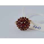 A garnet cluster ring 9ct size N 3.3 gms