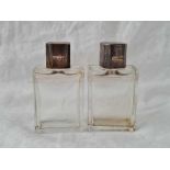 Pair of Octagonal silver topped Cologne bottle with glass bodies, Birmingham 1919