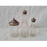 Three antique cruet bottles with glass bodies