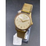 A GENTS GOLD longines WRIST WATCH WITH FLEX STRAP 9CT SECONDS SWEEP W/O