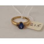 9ct hallmarked blue stone ring with diamond shoulders, size N