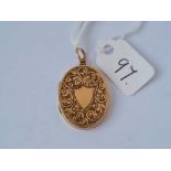 A oval 9ct ack and front locket 3.5 gms