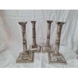 A set of four candlesticks of Adam design, 11" high, different nozzles