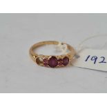 A garnet set ring one stone out 18ct gold size M 2.9 gms