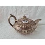 George II circular tea pot of compressed form, London 1883 by RE, EB, 550g