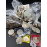 Plastic tub of coins