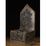 A Gothic Style Oak Offertory Box composed of slab planks,