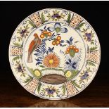 An 18th Century Style Polychrome Delft Plate.