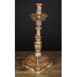 A 17th Century Spanish Painted Giltwood Candlestick.