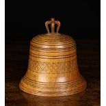 A Turned Treen Box in the form of a Bell.
