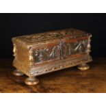 A 16th Century Italian Walnut Coffret with Renaissance revival carving.