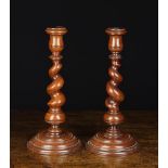 A Pair of 18th Century Treen Barley-twist Candlesticks of rich colour & patination.