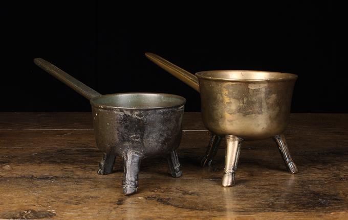 Two 17th/18th Century Bronze Skillets; each with a incised border line to the handle,