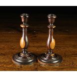 A Pair of Fine Early 19th Century Turned Lignum Vitae Candlesticks.