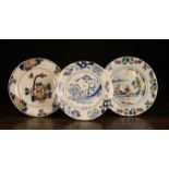 Three Late 18th Century Delft Plates with chinoiserie style decoration,