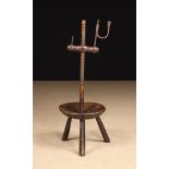 A Rare 18th Century Floor Standing Rush / Candle Light on a rustic height adjustable stand.