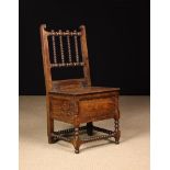 A 17th Century Joined Oak Box Seated Side Chair.