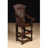 A 17th Century Joined Oak Child's High Chair.