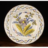 An 18th Century Polychrome Delft Plate.