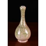 An Antique Chinese Suantouping Bottle Vase decorated with speckled green & pink simulated granite
