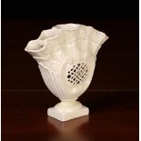 A Small Leeds Pottery Creamware Fan-shaped Vase on a rectangular pedestal foot.