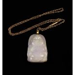 A Carved Lavendar Jade Pendant in the form of a Buddah,