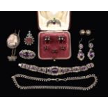 A Cased Set of 19th Century Breveté SGDG Patent HR Studs with garnet glass cabochons.