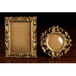 Two Small Carved Giltwood Picture Frames: A round Florentine frame with a convex glass aperture in