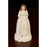 A Victorian Staffordshire Two-piece Titillating Figural Novelty modelled as a young woman in a