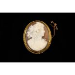 A Fine Quality Victorian Cameo Brooch intricately carved with a profile female bust of a Bacchante;