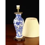 A Table Lamp having a Chinese blue & white baluster vase base decorated with a peacock amongst tree
