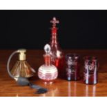 A Group of Coloured Glassware: A Victorian ruby flashed decanter with fillet ringed neck and ovoid