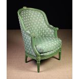 A Green Painted Upholstered Bergère Armchair.