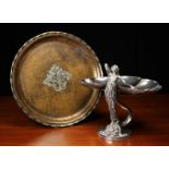 A Vintage White Metal Figural Centre Piece having a shell shaped bowl held aloft on the zoomorphic