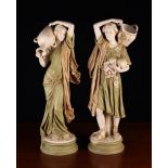 A Pair of Royal Dux Figures of Fruit & Water Carriers modelled as a man in draped robe gathering