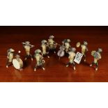 A Nine Piece Band of Miniature Cold Painted Bronze Dachshund Musicians.