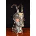 An Antique African Carved and Painted Wooden Mask of a Bull's Head, unknown origin,