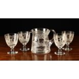 A Set of Four Engraved Glasses and a Matching Jug,