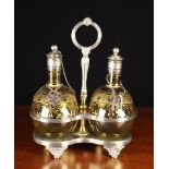 A Yellow Glass Decanter Set in a Silver Plated Stand.